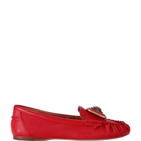 Red pebbled leather moccasin loafer with gold-tone chain and emblem detail, flat sole, moc-toe stitching
