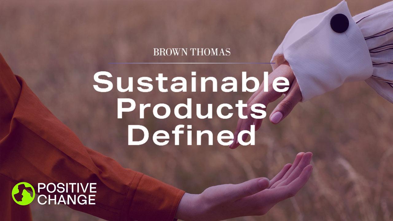 Two hands reaching towards each other with the text 'Sustainable Products Defined' and 'Positive Change' logo in the foreground.
