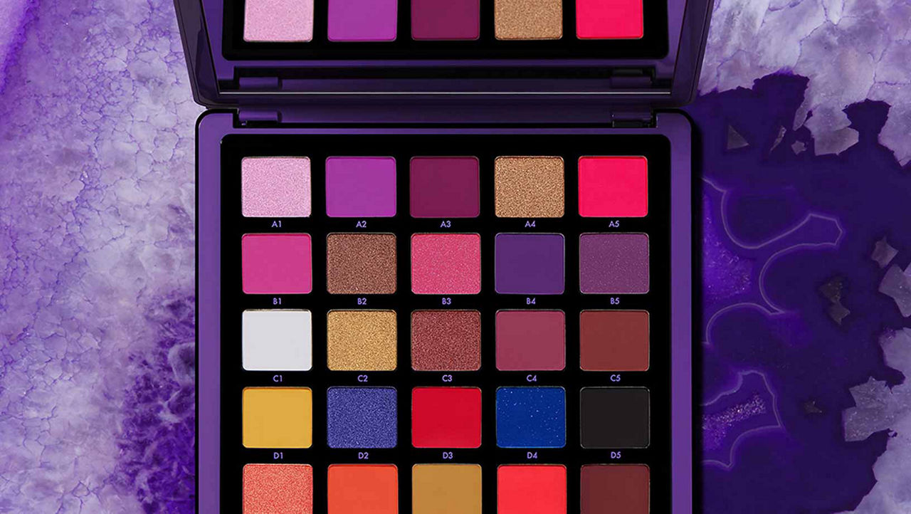 Anastasia Beverly Hills Norvina Pro Pigment Palette Vol. 2 on a purple marble effect background