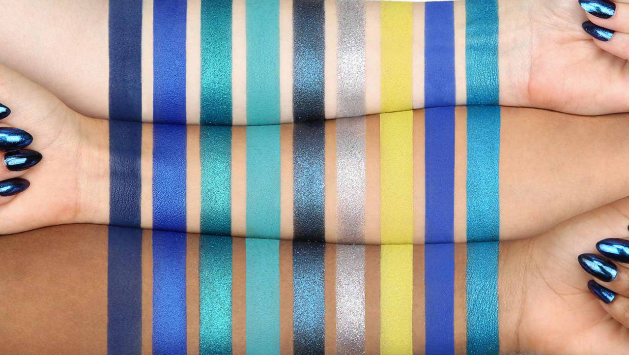  Huda Beauty Sapphire Obsessions palette swatched across three arms of different skin tones