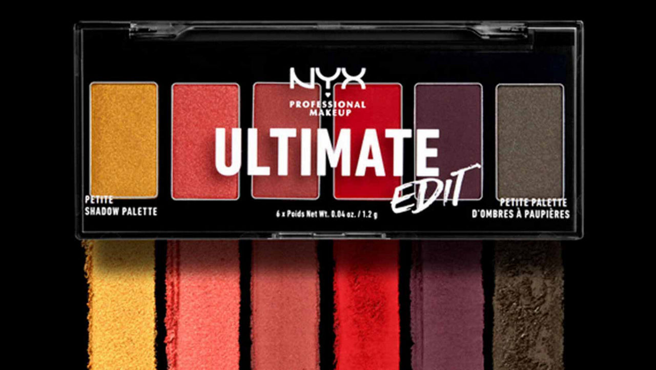 NYX Professional Makeup Ultimate Shadow Palette on a black background with the product swatched below the packaging