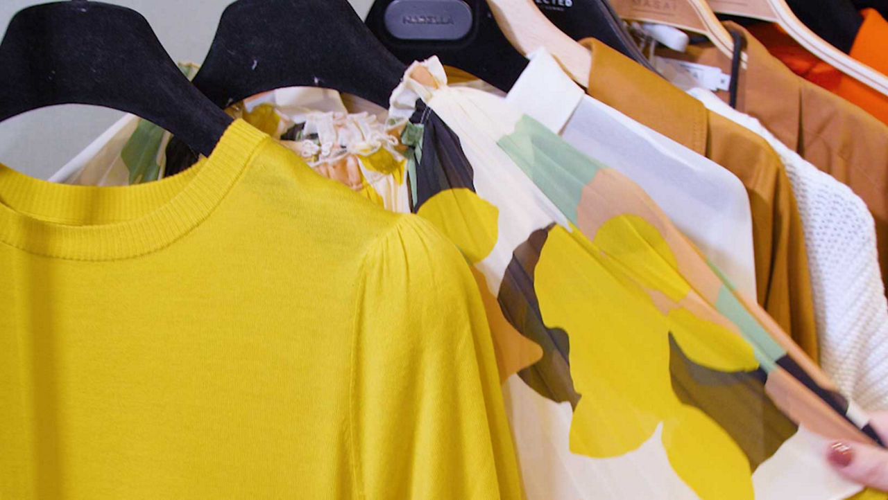Separate Clothes By Occasional and Season, close up of womens tops on hangers