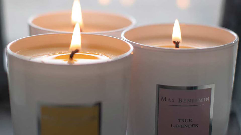 Trim the candle wick after every burn