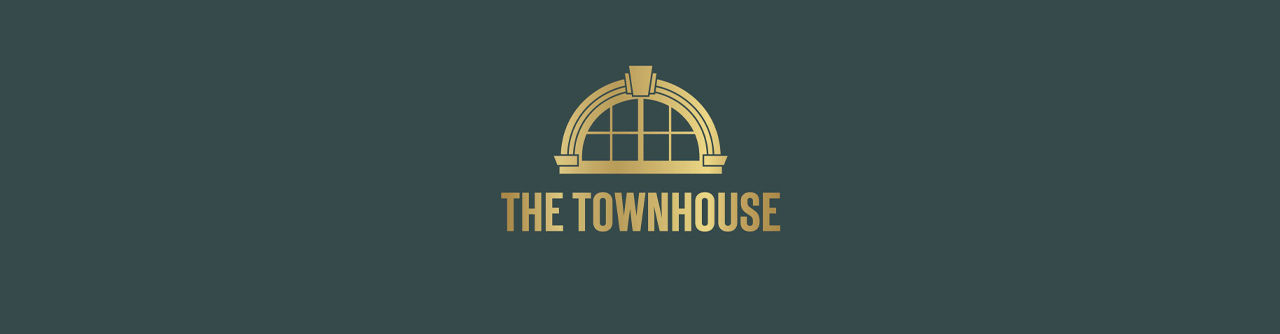 A golden arched window design with the text 'THE TOWNHOUSE' underneath on a dark green background.