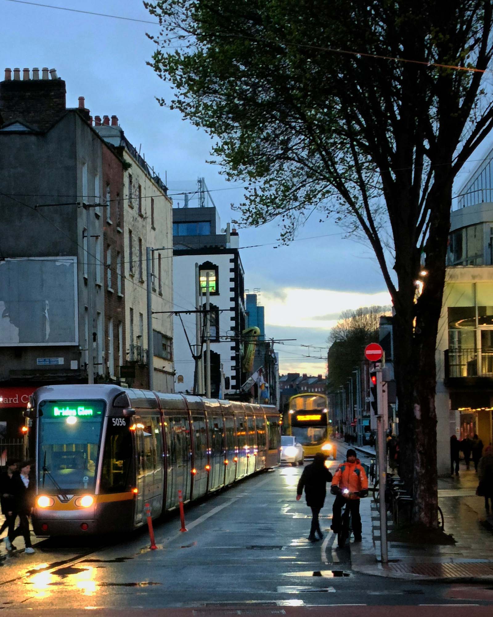 The Luas and Dublin Bus on Marlborough Street in the evening